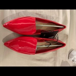 Red flat shoes